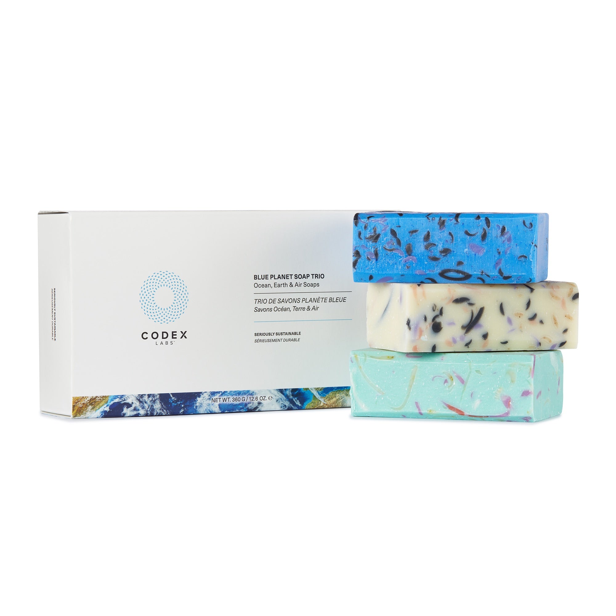 Blue Planet Soap Trio box with three bars of soap stacked on top of one another next to its packaging.