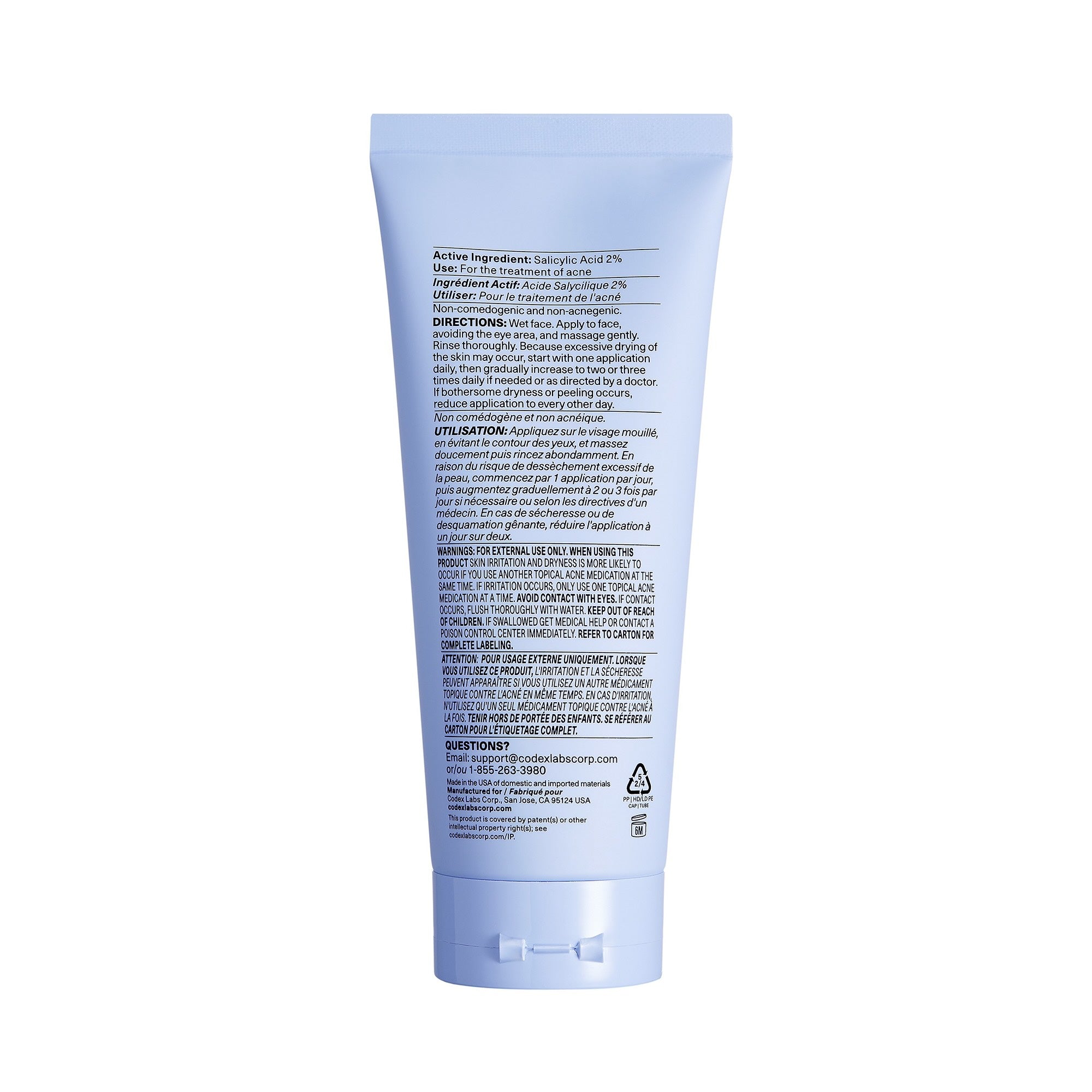 Shaant Pore Purifying Acne Face Scrub back of tube on white background.